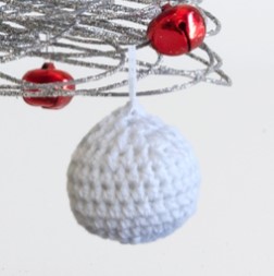 closeup of our crocheted christmas bauble free knitting pattern