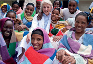 Patients proudly wear their blankets with Dr Hamlin