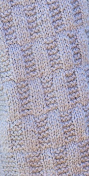 Detail of the patterning for the Arcadia Scarf in Rectangular Checks knitting kit KKA2311