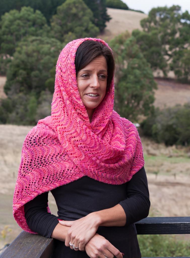Wrap worn as a headscarf in Malabrigo knitting yarn